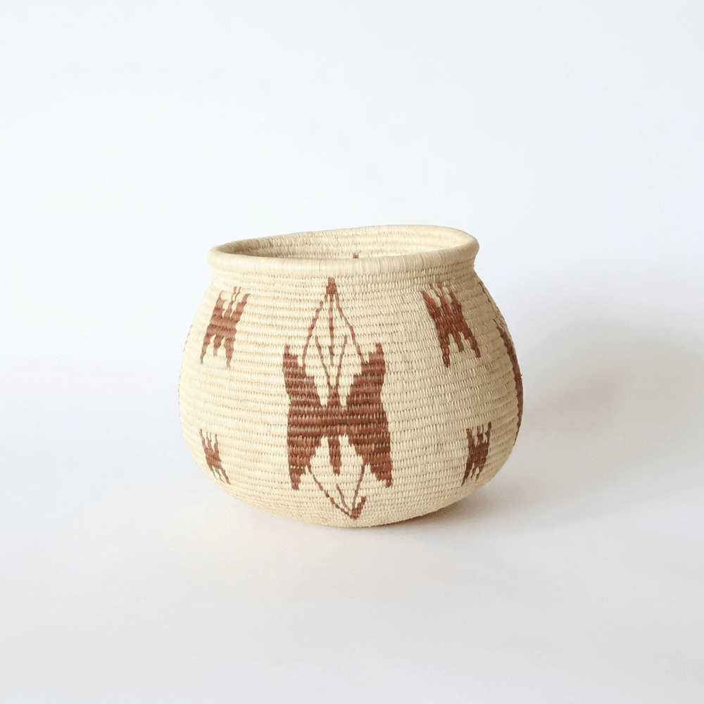 Mini handwoven palm basket with brown butterflies on leaves pattern by indigenous artisans
