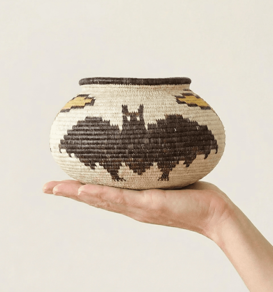 Small woven palm basket with vintage bats and birds motifs by Wounaan artisans from Panama