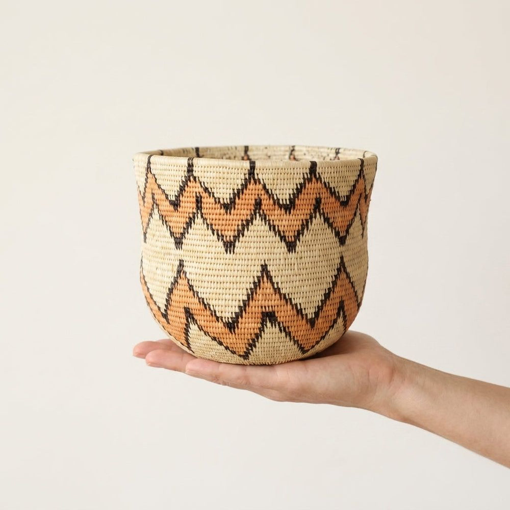 Mini woven bowl basket with orange black zigzag pattern on cream base by indigenous artisans